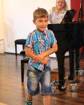 Kind bei der Mozart Veranstaltung